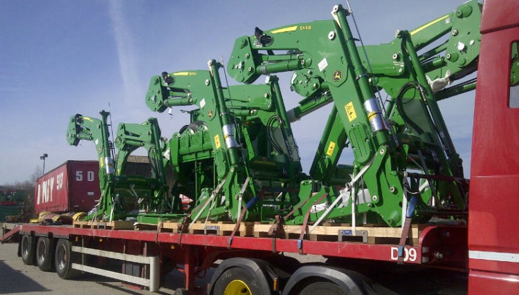 Agricultural machinery on a flatbed trailer